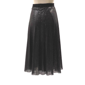 The BLACK SKIRT SEQUIN by SEVENTY is a knee-length, black pleated skirt made with shimmery textured fabric, perfect for an evening out. This fun skirt features an elastic waistband and is displayed on a white mannequin against a plain background.