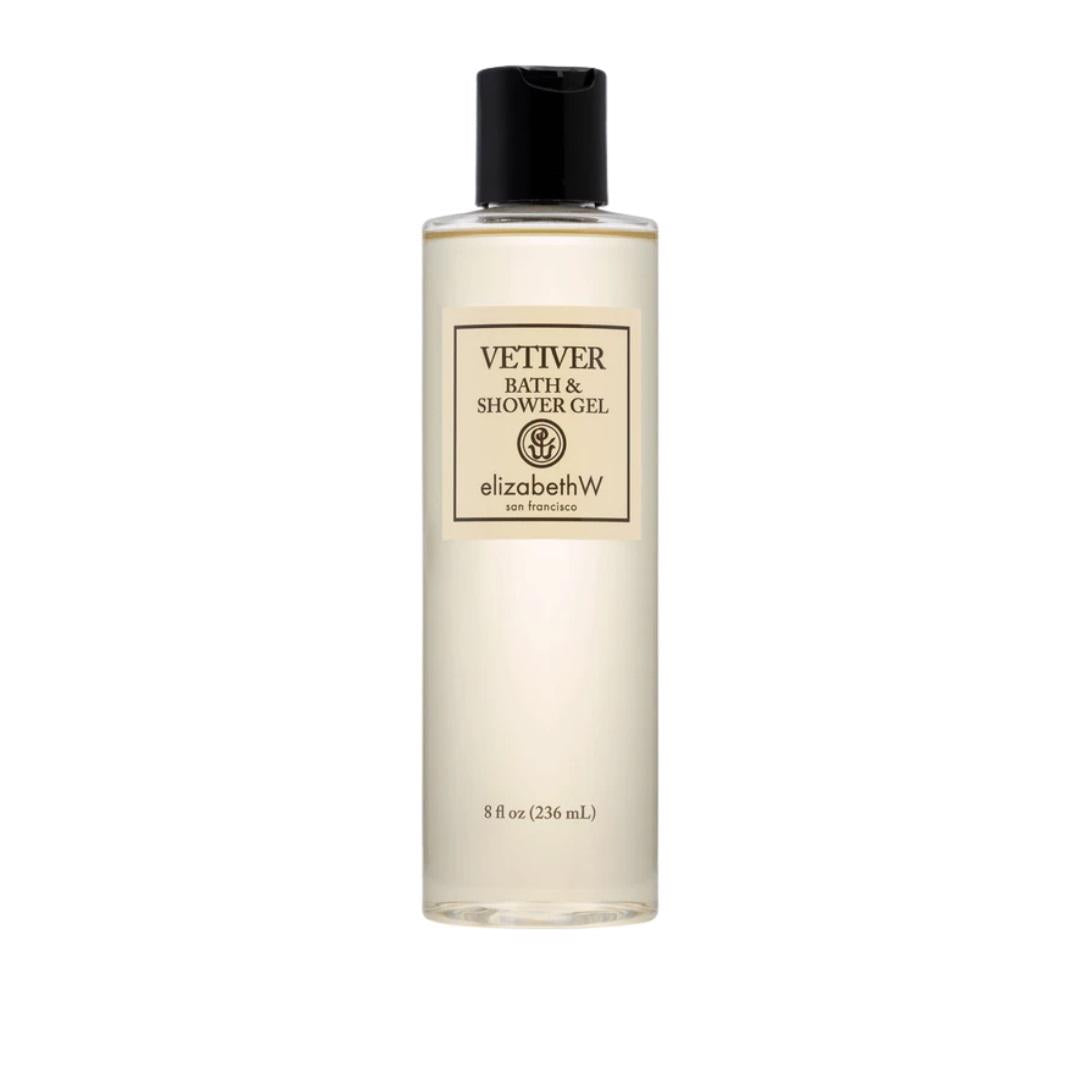 A clear plastic bottle of VEETIVER SHOWER GEL by E WIGHTMAN &amp; CO with a black cap. The beige label on the front reads "Vetiver Bath &amp; Shower Gel, elizabethW, San Francisco" and "8 fl oz (236 mL)." Perfect for refreshing showers, it gently cleanses, leaving you with great smelling skin. The bottle is isolated on a white background.