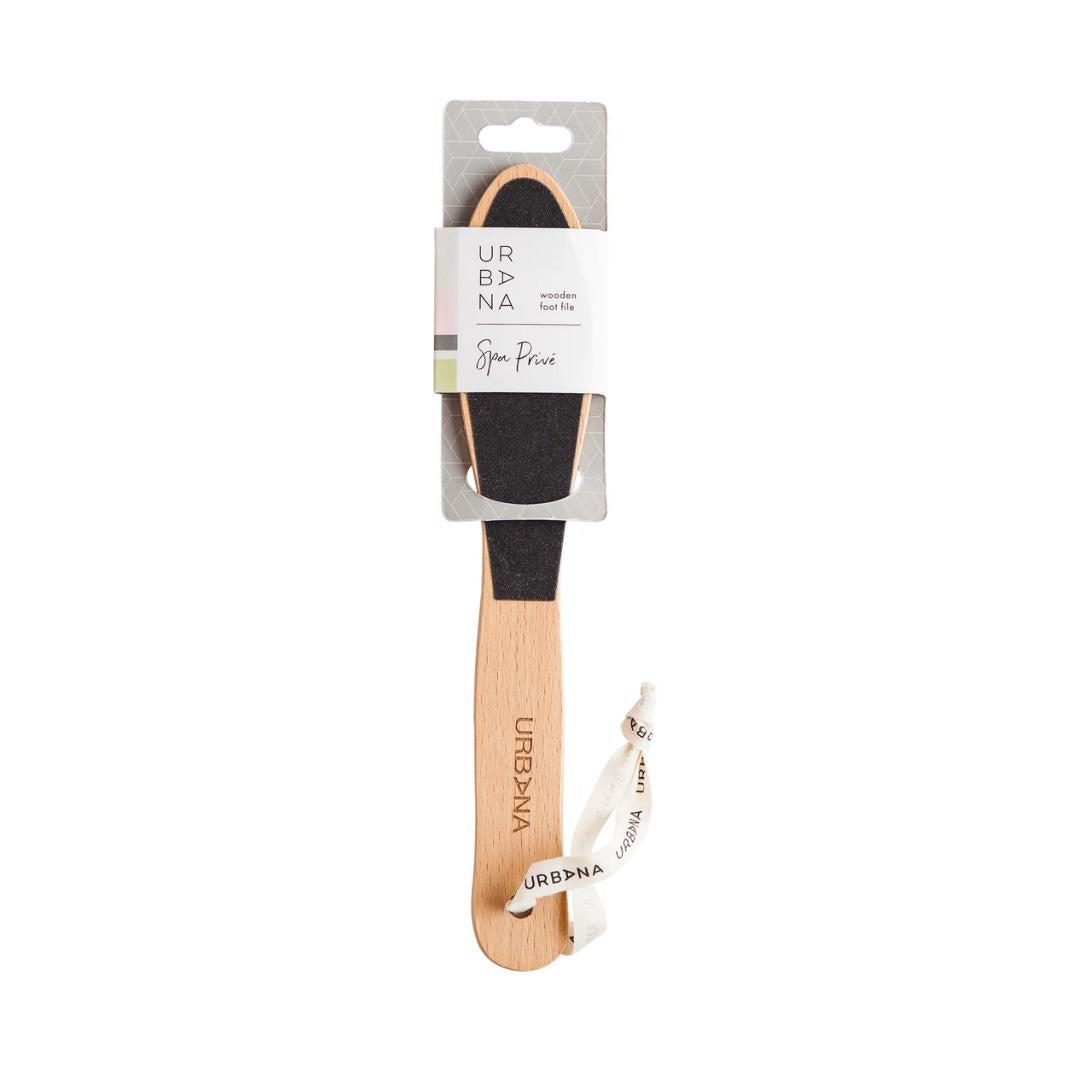 A wooden foot file with a black sanding surface is displayed against a white background. It features a white looped string attached to the handle for hanging. Designed to help remove dead skin, this natural bath product's packaging label reads "WOODEN FOOT FILE" by EUROPEAN SOAPS, LLC.