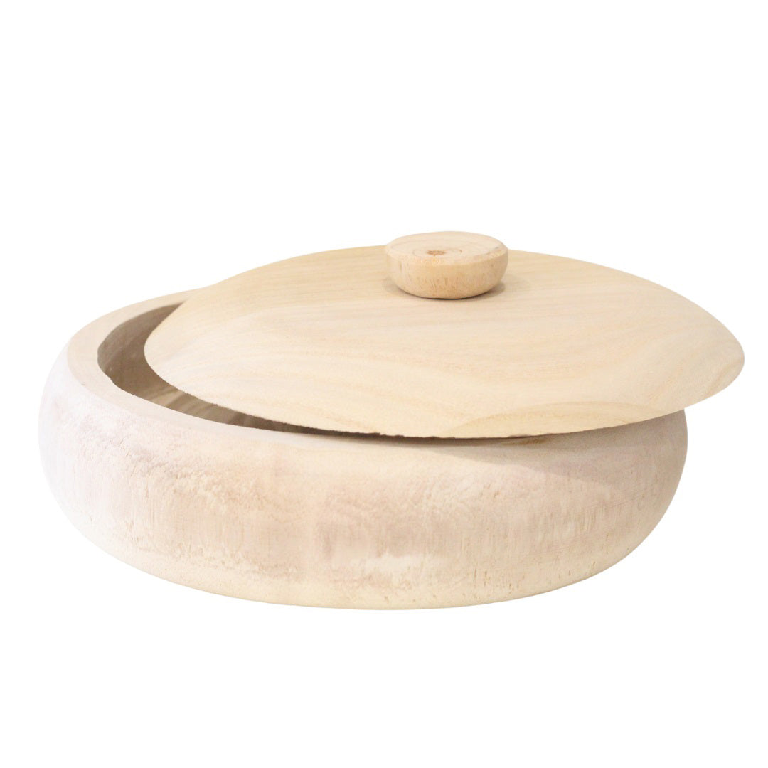 The PAULOWNIA WOOD CONTAINER by CREATIVE COOP is a round wood container with a matching lid, slightly open. The bowl and lid feature a smooth, light-colored finish that beautifully showcases the natural wood grain patterns. A small knob on top of the lid ensures easy lifting.