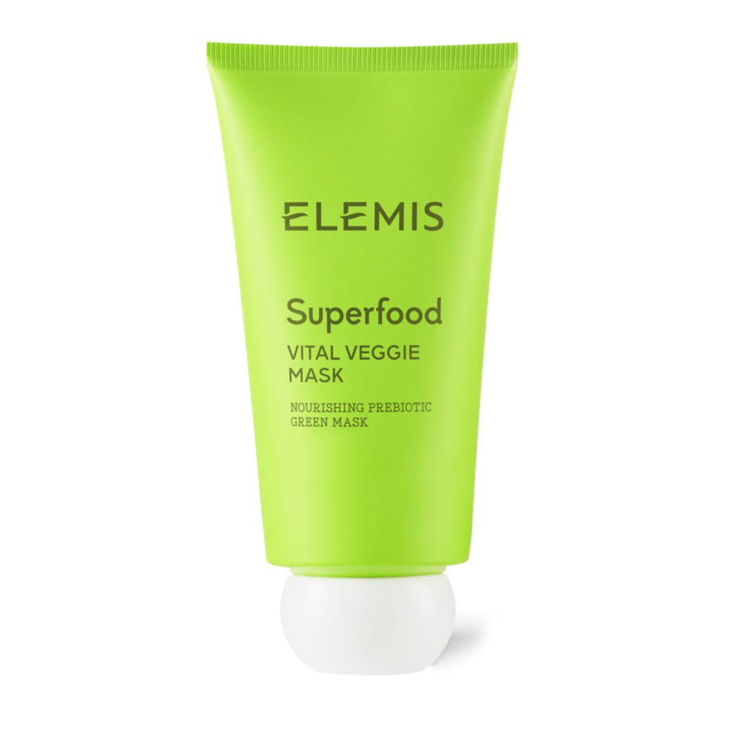 A green tube of ELEMIS - STEINER Superfood Vital Veggie Mask is displayed against a white background. The packaging reads &quot;Nourishing Prebiotic Green Mask,&quot; indicating it nourishes and hydrates the skin. This moisturizing mask, enriched with Omega Fatty Acids 6 and 9, features a white cap at the bottom.