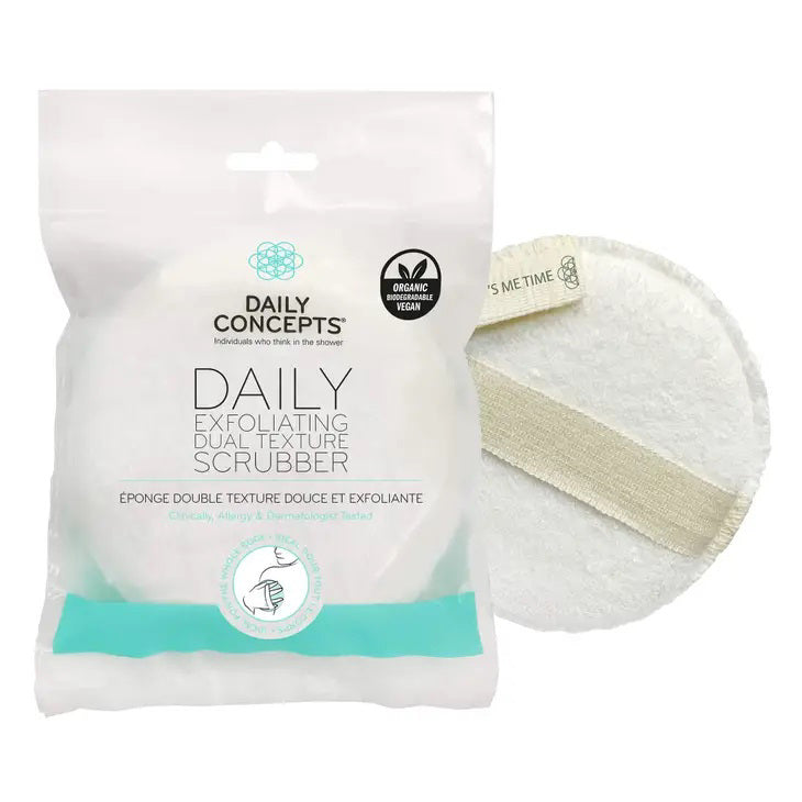 The DAILY CONCEPTS EXFOLIATING BODY SCRUBBER, enclosed in a clear plastic bag with branding details, features a circular design with dual textures for the ultimate exfoliation experience. One side is soft while the other is more abrasive. A beige strap on the back ensures easy grip and enhances your skin’s glow.