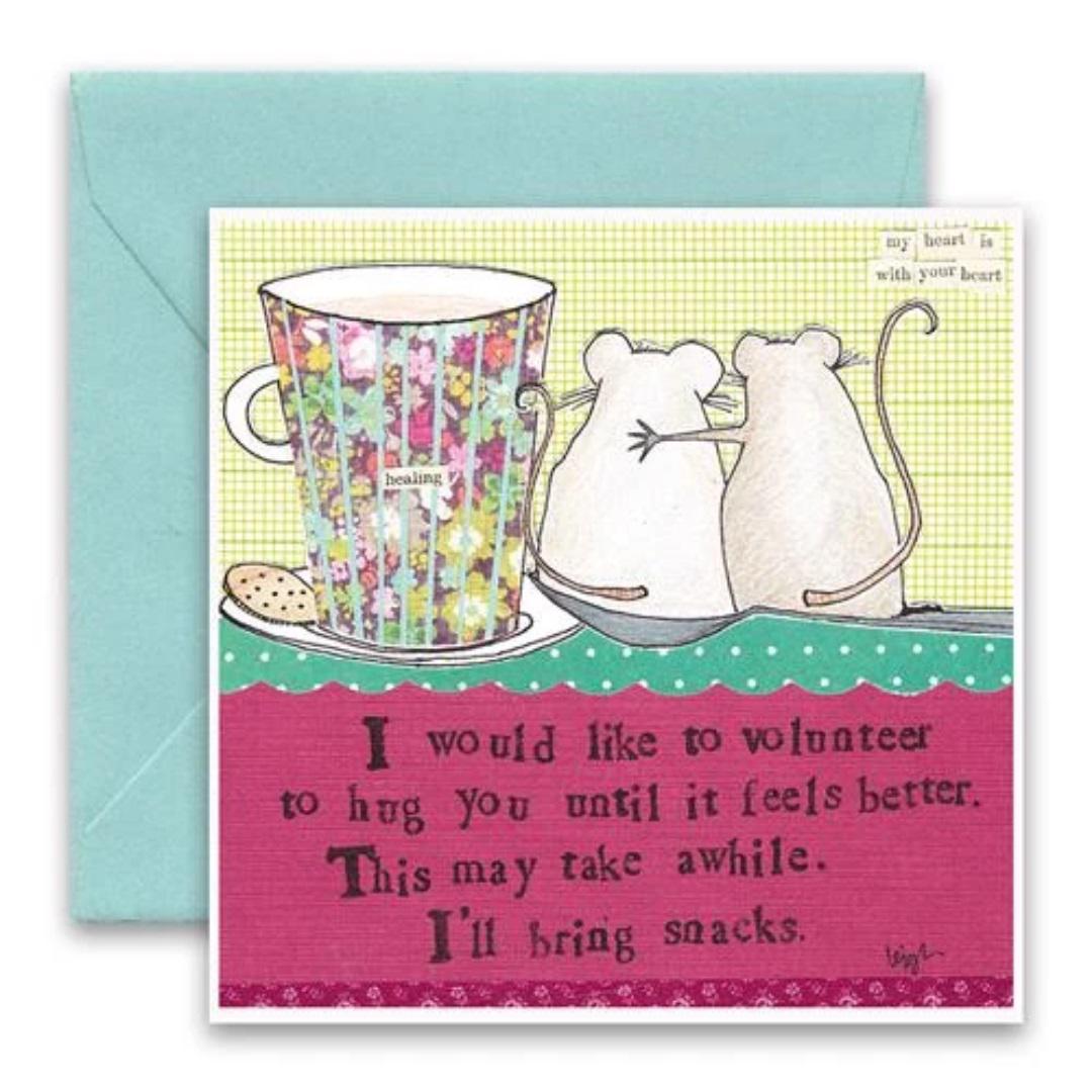 The CURLY GIRL DESIGNS - HUG YOU CARD by CURLY GIRL DESIGN, INC. features a charming scene of two mice embracing beside a floral teacup with a cookie on a saucer. The heartfelt message reads: "I would like to volunteer to hug you until it feels better. This may take a while. I'll bring snacks." An envelope is included behind the card, adding to the overall warmth and charm of this collage art piece.