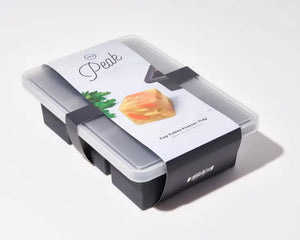 A W&P Design branded Cup Cube Freezer Tray (6) with a transparent lid is displayed against a white background. The packaging features an image of square frozen cubes containing herbs and fruit. Crafted from food-safe silicone, the tray is designed to make large, gourmet ice cubes.
