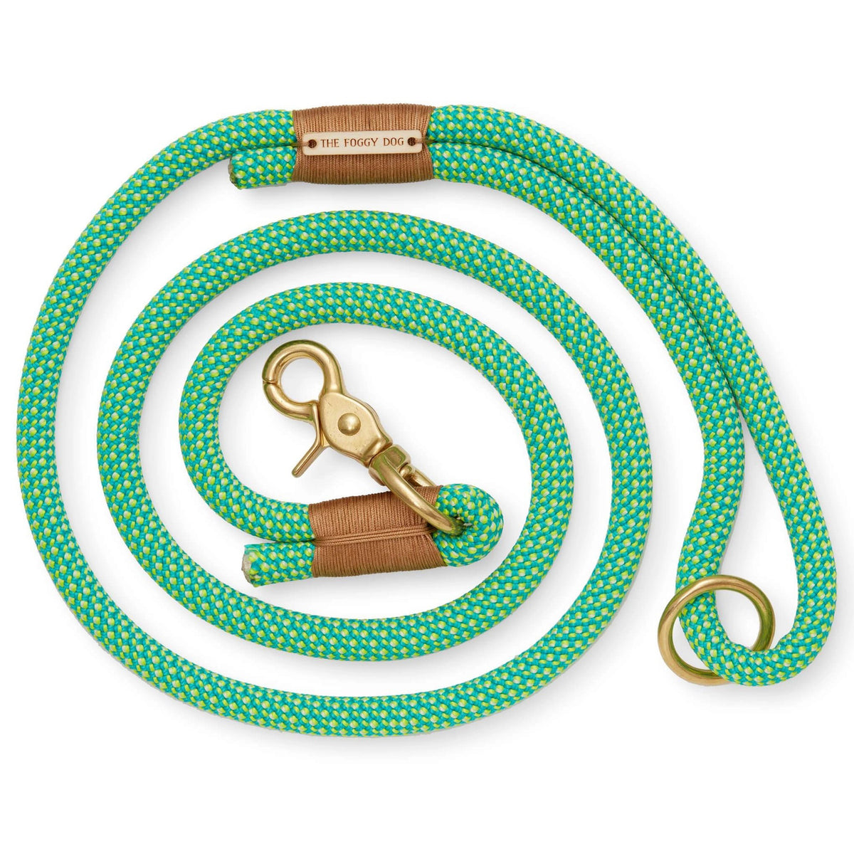 The DOG LEASH (SPEARMINT) by THE FOGGY DOG is a stylish and tough coiled green dog leash made from durable nylon climbing rope with white speckled patterns. It features marine-grade brass hardware at one end for attaching to a collar and a tan leather accent near the clip.