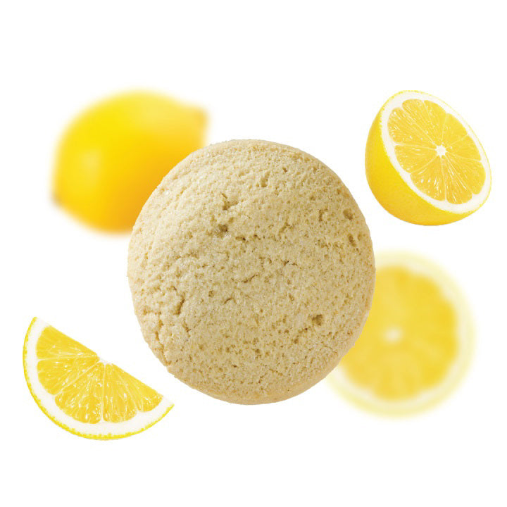 A package of WOW BAKING - GLUTEN FREE LEMON BURST COOKIE from WOW BAKING COMPANY is displayed. The front features a large image of the cookie and text stating it is made with real lemon oil, a wheat and gluten-free flour blend, natural ingredients, GMO-free, and weighs 2.75oz (78g). The bottom reads "Moist, Chewy, Delicious.