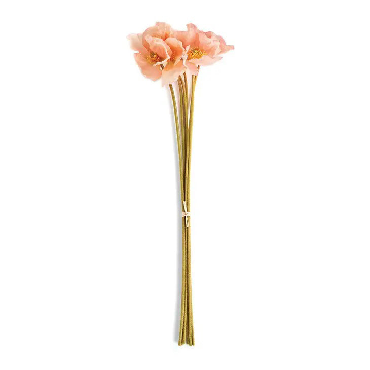 A bunch of peach artificial poppies with yellow centers and realistic green stems tied together with a white band. Perfect for home or office decor, the Napa Home and Garden Poppies, Bundle of 6, have delicate, translucent petals and are arranged in a simple, upright manner against a plain white background.