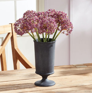 The NAPA HOME AND GARDEN - ALLIUM STEM BUNDLE features three tall, life-like purple allium flowers with long green stems, tied with a string against a white backdrop.