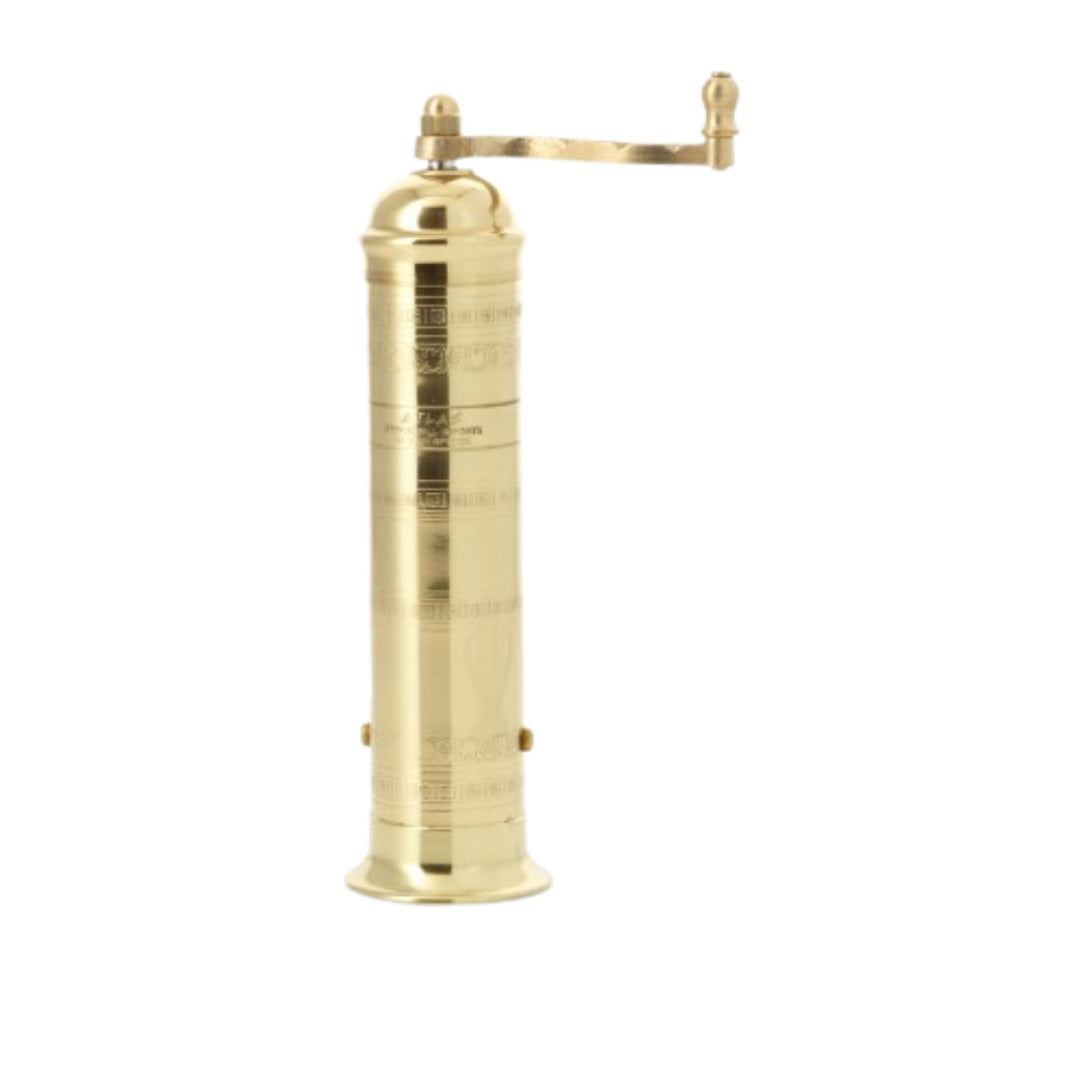The ATLAS BRASS PEPPER MILL 9 by PEPPER MILL IMPORTS is a manual coffee grinder featuring a cylindrical body, an ornate handle on the top, and a round base. The side showcases intricate engraved patterns. The horizontally extended handle indicates the adjustable mechanism for grinding.