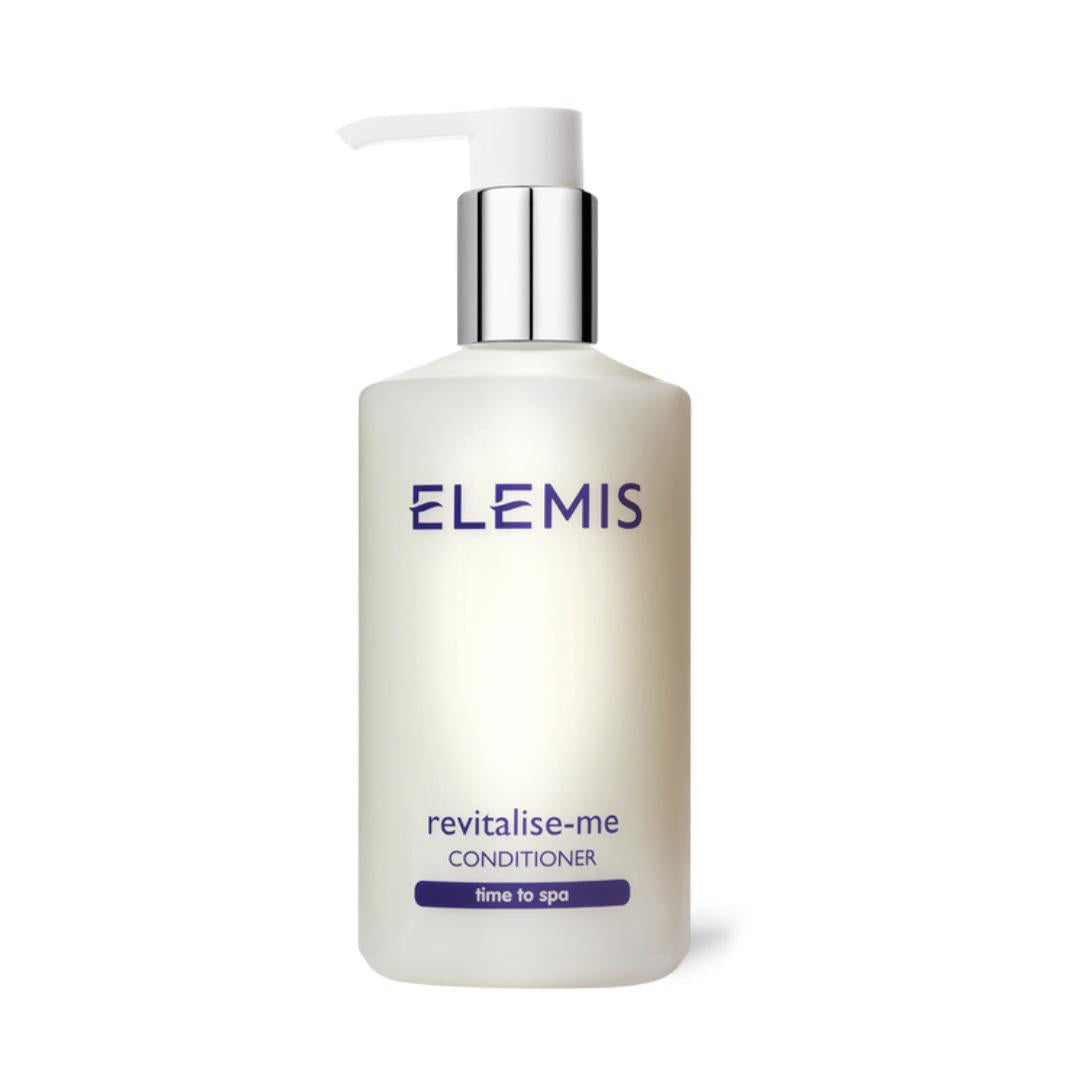 A white pump bottle with a silver neck and clear plastic cap, labeled &quot;ELEMIS - STEINER&quot; in blue font. Below the brand is the text &quot;REVITALISE ME CONDITIONER&quot; and &quot;time to spa.&quot; The nourishing conditioner is designed for shiny hair on a white background.
