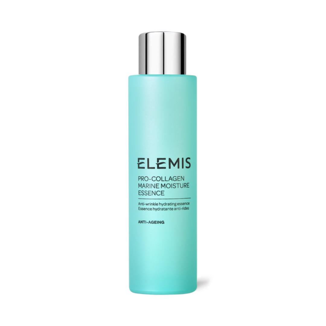 A blue cylindrical bottle with a silver cap labeled &quot;ELEMIS - PRO-COLLAGEN MARINE MOISTURE ESSENCE&quot; by ELEMIS - STEINER. The text indicates it is a hydrating essence with anti-wrinkle and anti-ageing properties, enhanced by Hyaluronic Acid. The bottle has a sleek and minimalist design.