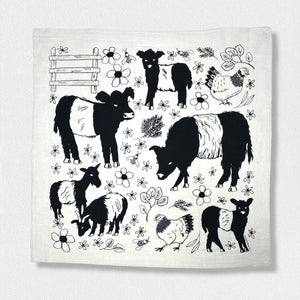 Introducing the FEARRINGTON SIGNATURE COLLECTION - BESPOKE BELTIE BARNYARD TEA TOWEL by CALHOUN & CO. This charming tea towel features black and white illustrations of farm animals, including cows, goats, sheep, and chickens, surrounded by flowers and plants. A wooden fence is depicted in the top left corner. The light-colored background makes it a perfect hostess gift.