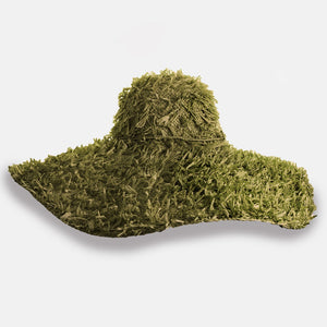 The SUMMERTIME HAT by SANS ARCIDET features a wide brim and a rustic, shaggy texture. Its loosely woven design offers a casual, bohemian vibe, with fringed crown and brim that enhance its rough, natural look. Perfect as a beach accessory, this adjustable hat stands out brilliantly against the plain white background.