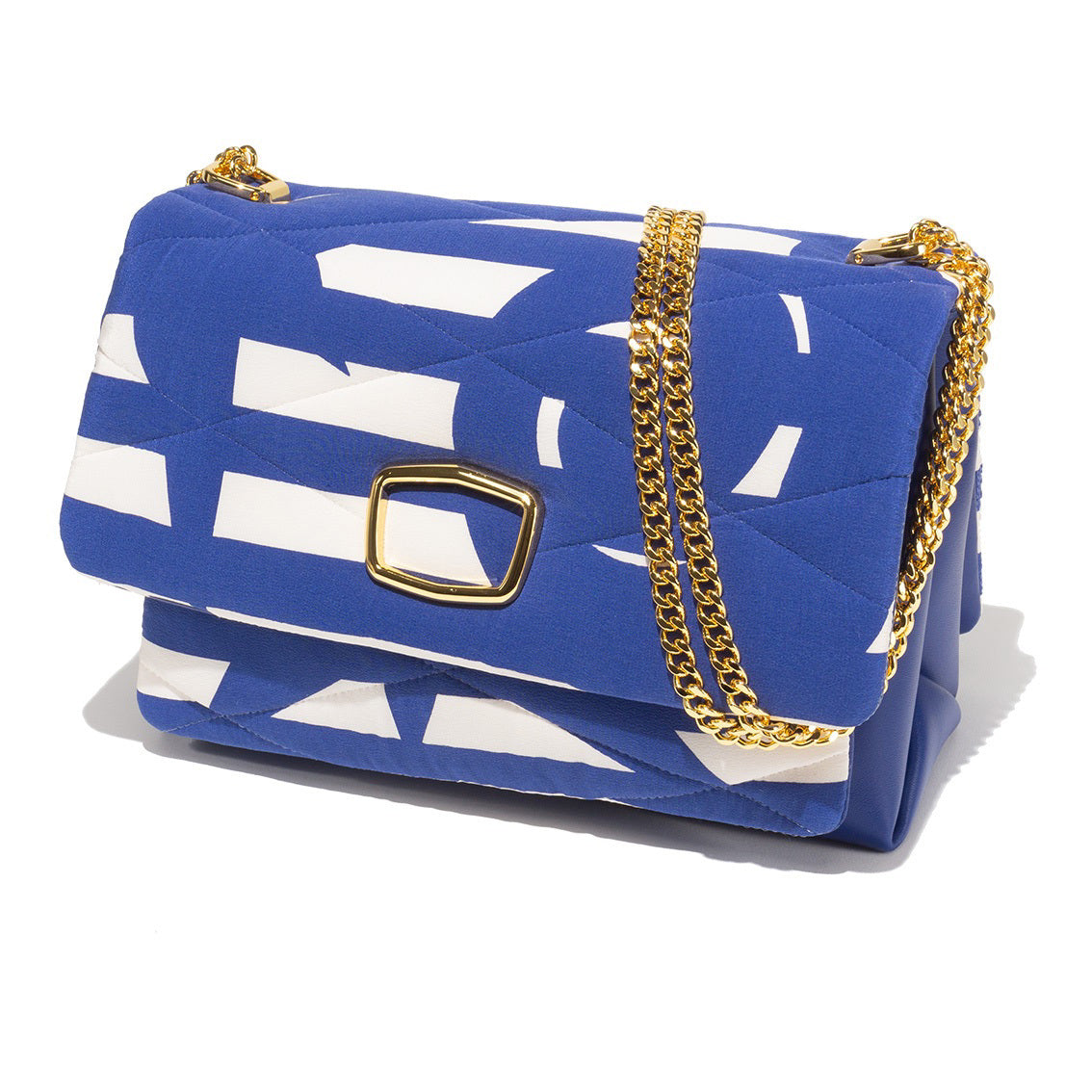 Introducing the VINTAGE SCARF AND LEATHER HANDBAG (VALENTINO) by MILANO MM33 - a stunning and distinctive blue quilted handbag adorned with white geometric patterns, featuring a rectangular gold clasp and a luxurious gold chain strap. Crafted in Italy from lambskin and a vintage scarf, this exquisite piece perfectly stands out against any plain white background.