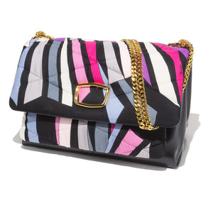 The VINTAGE SCARF AND LEATHER HANDBAG (PUCCI) by MILANO MM33 is a stylish lambskin bag featuring a gold chain strap and a geometric pattern on the flap. Designed with prominent abstract stripes in black, white, pink, purple, and blue, the flap is elegantly closed with a gold buckle. This exquisite accessory proudly bears the mark of Italian craftsmanship.