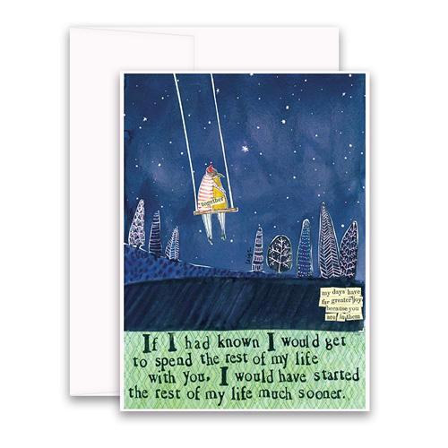 The CURLY GIRL DESIGNS - STARTED MUCH SOONER GREETING CARD by CURLY GIRL DESIGN, INC showcases a collage art illustration of a person on a swing against a starry night sky, surrounded by abstract trees. The text on the card reads, "If I had known I would get to spend the rest of my life with you, I would have started the rest of my life much sooner.