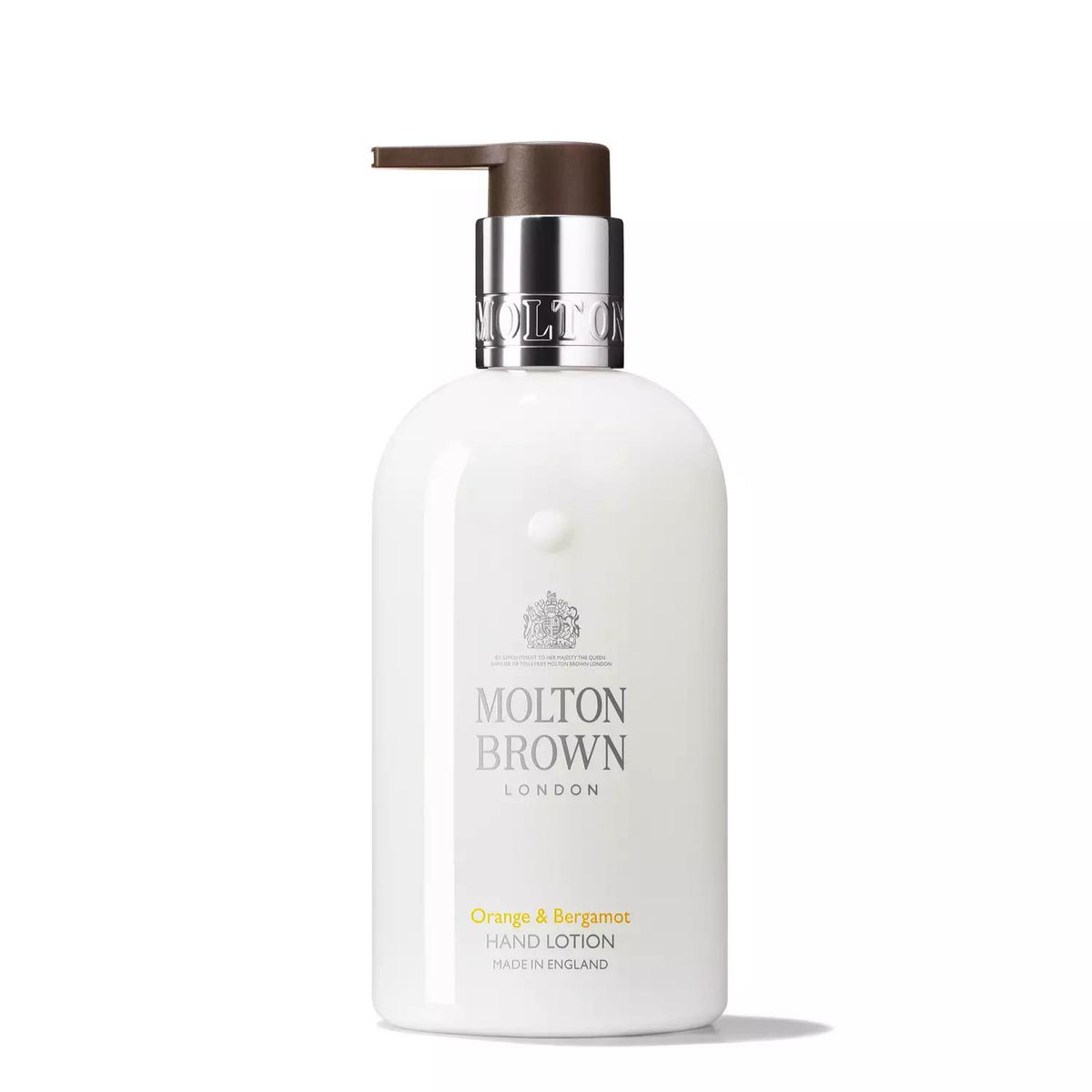 A white bottle of Molton Brown hand lotion with a dark brown pump, featuring the label "Molton Brown London" and "Orange and Bergamot Hand Lotion Made in England.