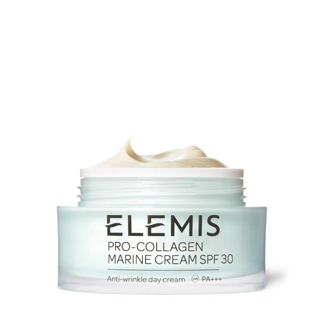 A jar of ELEMIS - PRO-COLLAGEN MARINE CREAM SPF 30 by ELEMIS - STEINER is pictured. The light blue-green jar is open, revealing the white cream inside. The label states it is an anti-wrinkle moisturizer that provides hydration and protection with SPF 30.