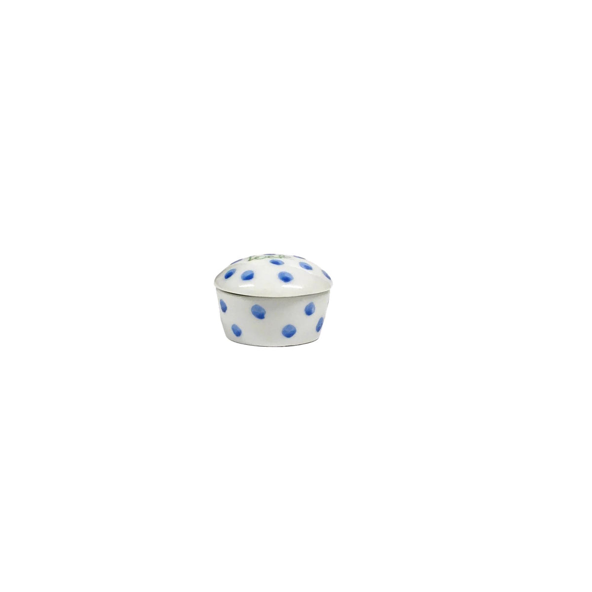 A bespoke, small round porcelain keepsake by ANN MARIE MURRAY, L.L.C., featuring blue polka dots and green cursive text "FIRST LOCK" meticulously hand-painted in the center.