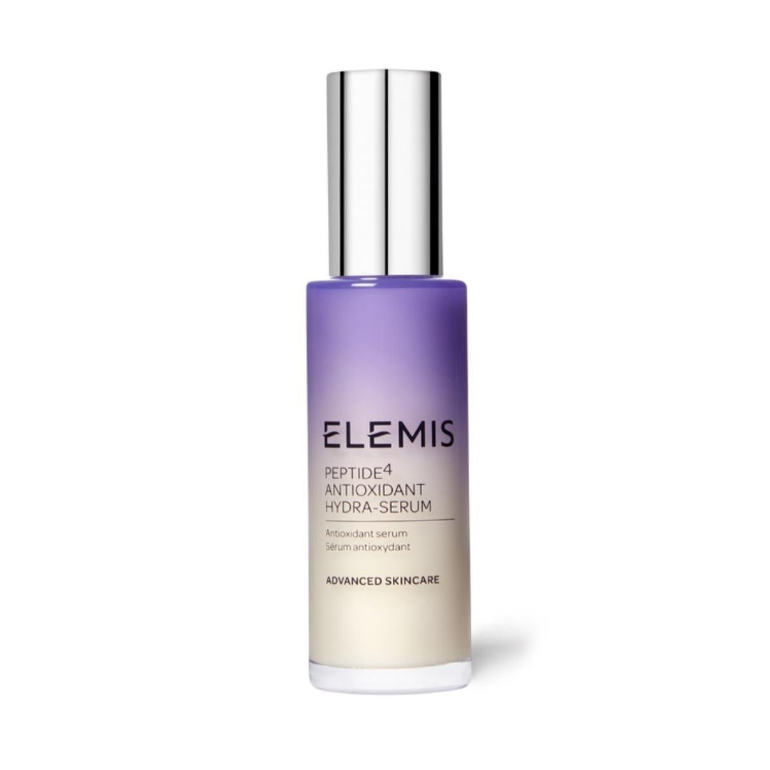 A bottle of ELEMIS - PEPTIDE4 ANTIOXIDANT HYDRA SERUM, enriched with hyaluronic acid for hydration, is displayed against a white background. The bottle features a gradient design that transitions from purple at the top to a creamy hue at the bottom, and it is capped with a metallic silver lid. The product comes from the brand ELEMIS - STEINER.