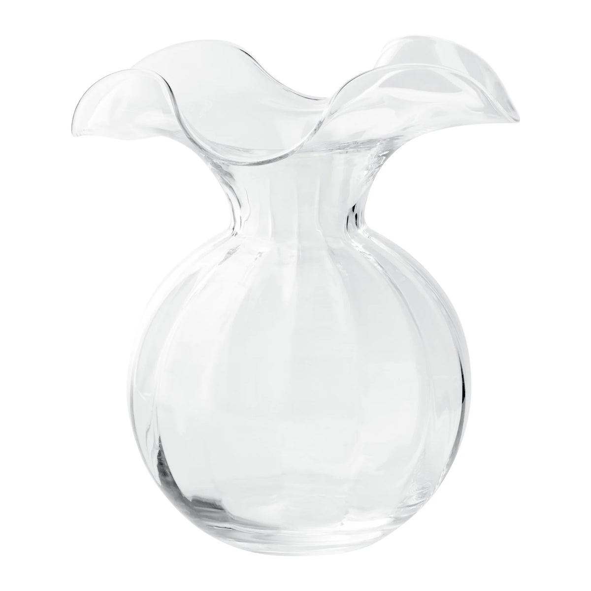The VIETRI - HIBISCUS MEDIUM VASE CLEAR features a round base and a wide, wavy-edged rim. Inspired by Tuscan artisans, this clear glass vase from VIETRI boasts a smooth, glossy finish and an elegant, flowing design that embodies the beauty of craftsmanship.
