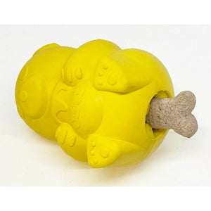 The TREAT DISPENSER HONEY BEAR (L) by SODA PUP is a durable, bright yellow rubber bear toy that holds a jar labeled "USA" with a dripping honey design. Made in the USA, it features rounded ears, circular eyes, a small nose, and detailed paws. This chew toy is also designed to dispense treats.