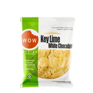 A packet of WOW Baking Company's Gluten-Free Key Lime White Chocolate Cookies. The packaging features a prominent "WOW" logo, mentions "made with natural ingredients" and "GMO free." Text at the top highlights that the product is wheat and gluten-free.