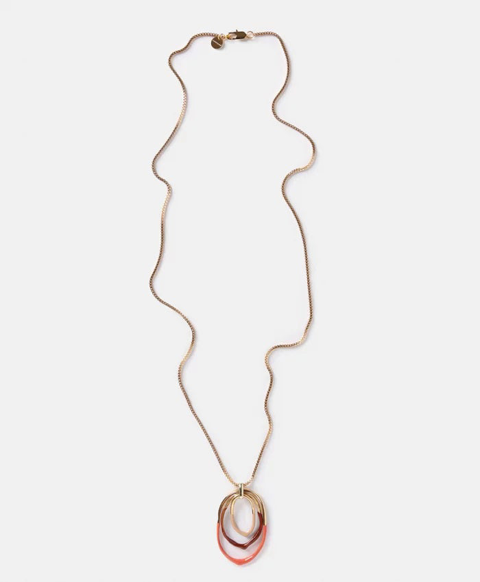 The DIP DYED NECKLACE by MOMONI is a long gold necklace featuring a delicate Venetian chain and interlocking oval pendants at the center. Made in Italy, the pendants showcase a layered look with gold, white, and coral colors. The necklace is displayed flat on a white background.
