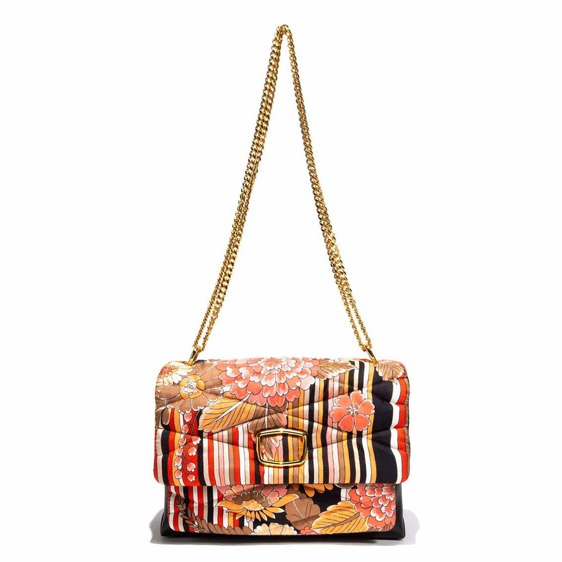 Introducing the VINATAGE SCARF AND LEATHER HANDBAG RED &amp; BLACK by MILANO MM33. This stylish lambskin handbag boasts a colorful floral and striped pattern, reminiscent of a vintage scarf bag. The design includes vibrant shades of orange, red, black, and white. It features a quilted texture, a prominent buckle on the front, and a gold chain strap. Proudly made in Italy.