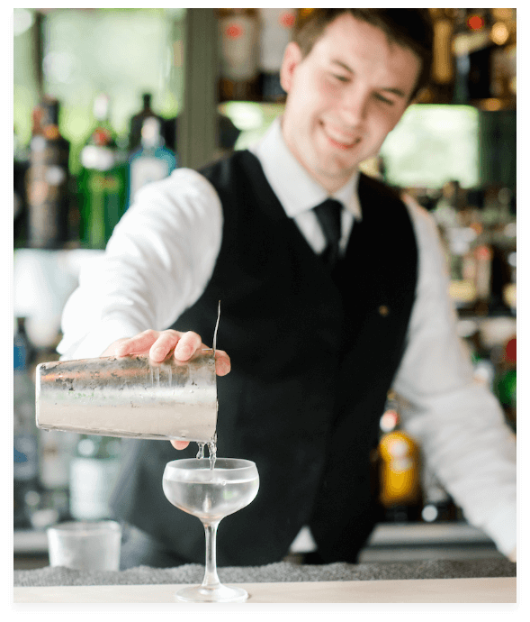 Bartender at the Fearrington House making a cocktail