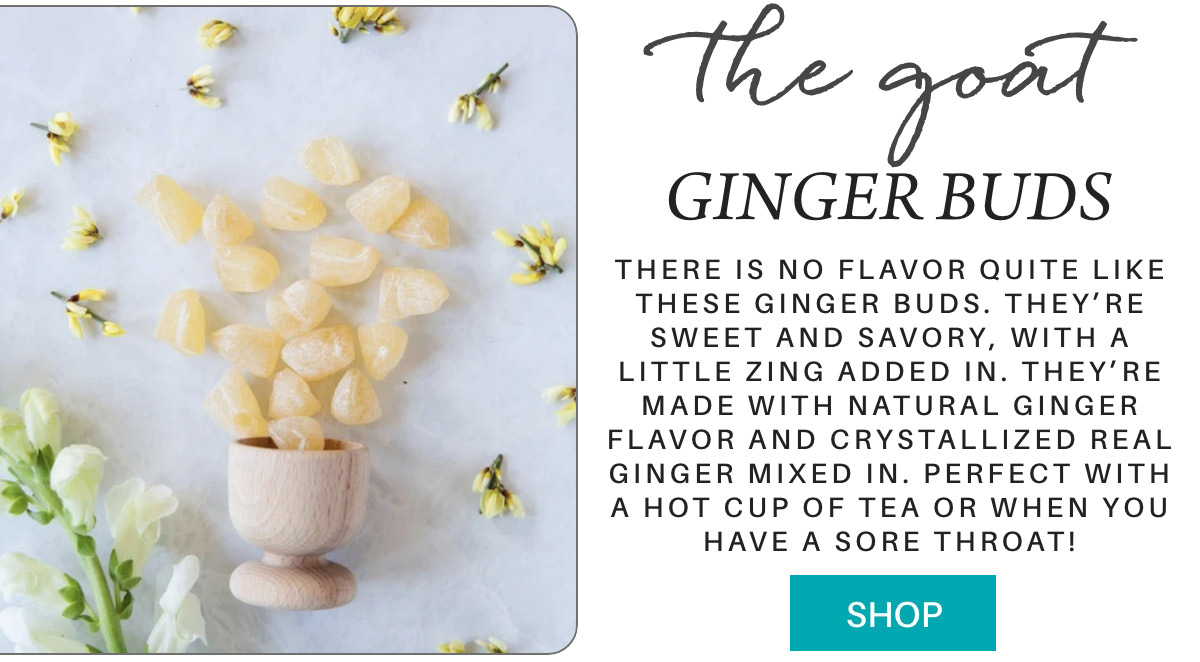 An assortment of ginger buds is displayed on a light blue surface, with some buds placed in a wooden cup. Small yellow flowers are scattered around. Text on the right reads, "The goat ginger buds" along with a description of the product. Below is a turquoise "SHOP" button. Fearrington Village