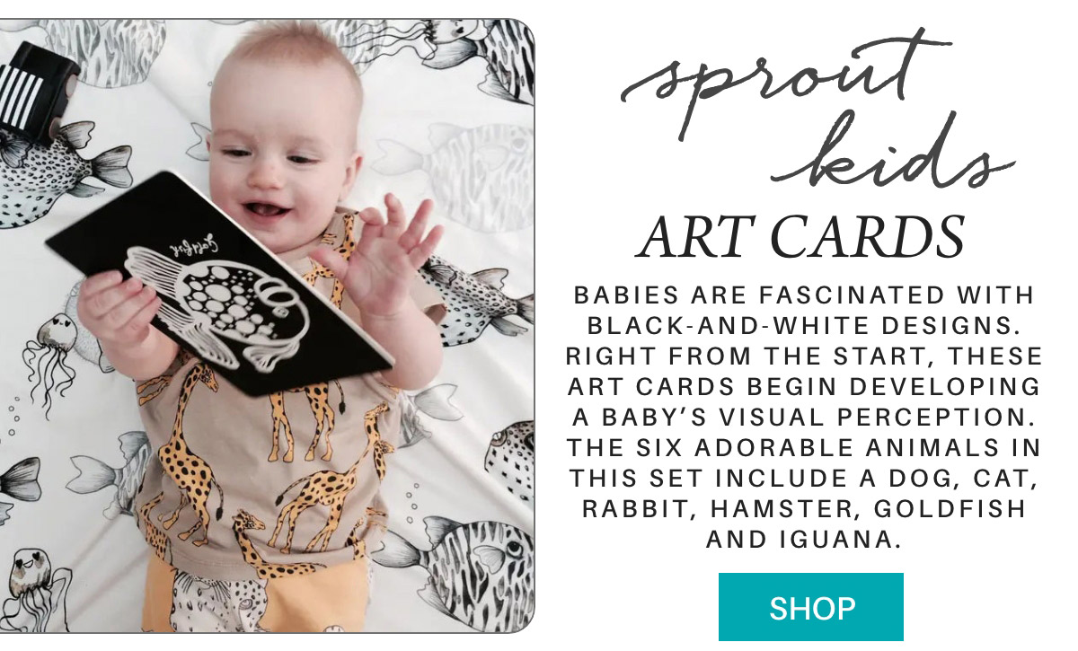 A baby smiling while holding a black-and-white art card with an animal design. Text beside reads: "Sprout Kids Art Cards. Babies are fascinated with black-and-white designs..." and a "Shop" button is at the bottom. The baby is lying on a patterned blanket. Fearrington Village