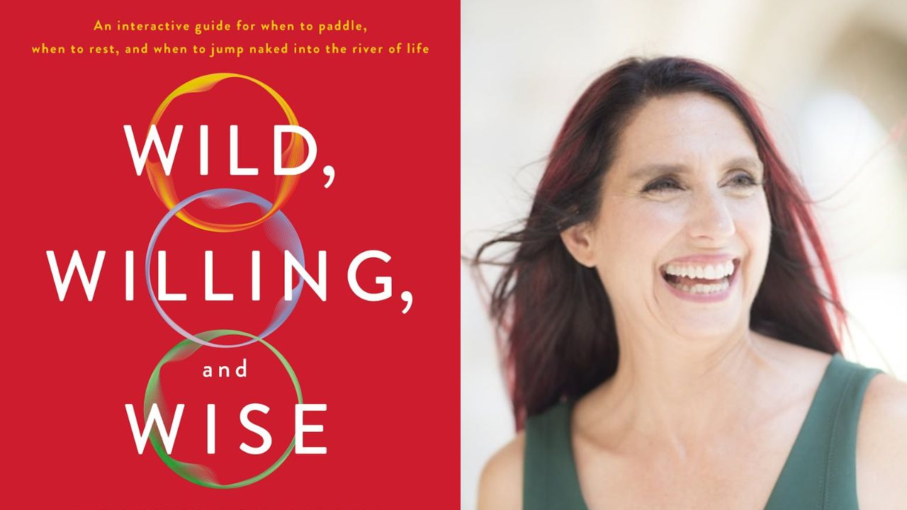 On the left side, a book cover with a red background titled "Wild, Willing, and Wise" with overlapping colored circles. A subtitle reads, "An interactive guide for when to paddle, when to rest, and when to jump naked into the river of life." On the right side, a woman with long dark hair and a wide smile is looking to the right, wearing a sleeveless top. Fearrington Village