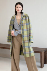 model wearing plaid kinross coat