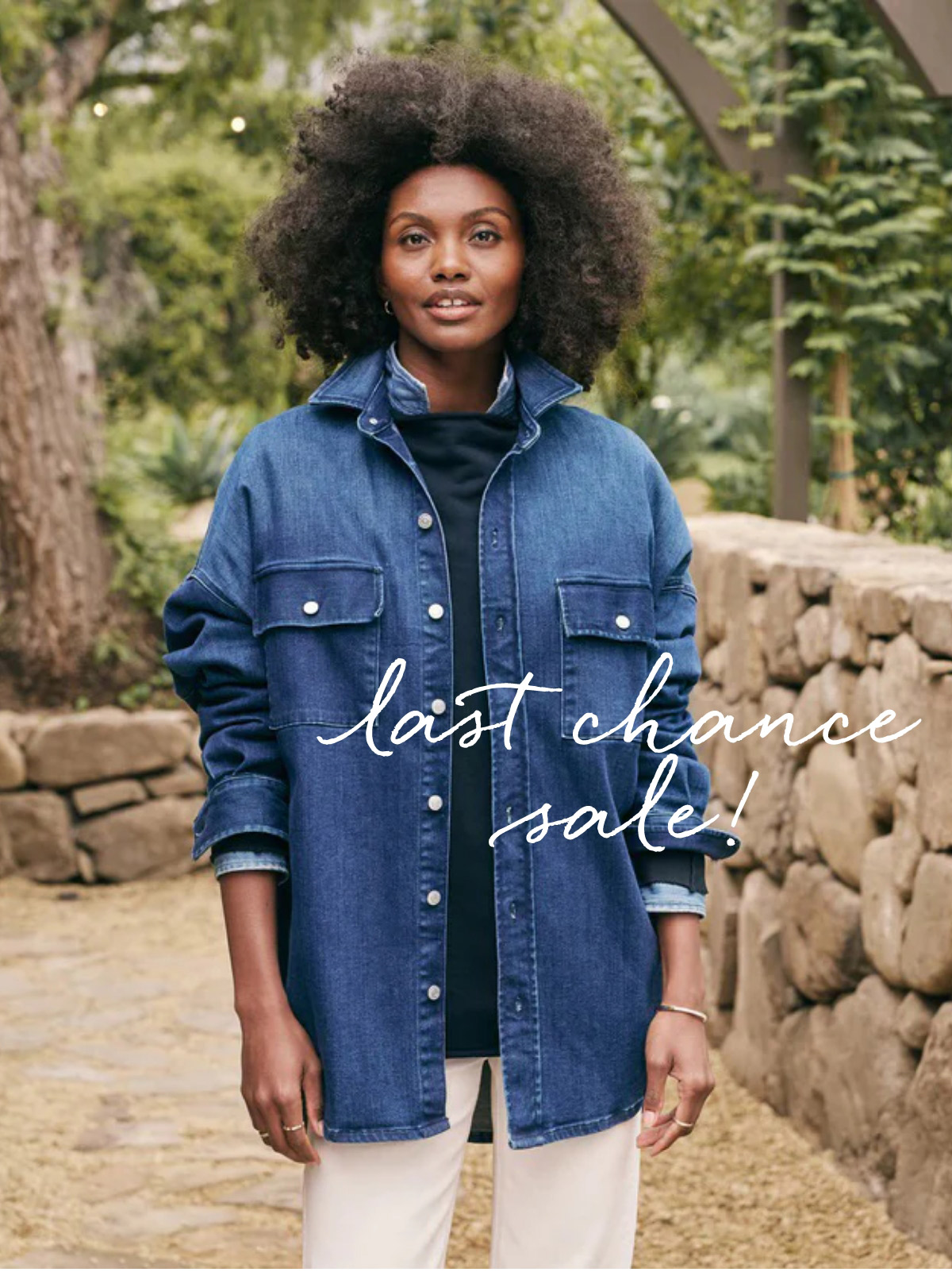 A person with natural curly hair wearing a denim jacket stands outdoors on a stone path with lush greenery in the background. Text overlay reads "last chance sale!" in a stylish cursive font. Fearrington Village