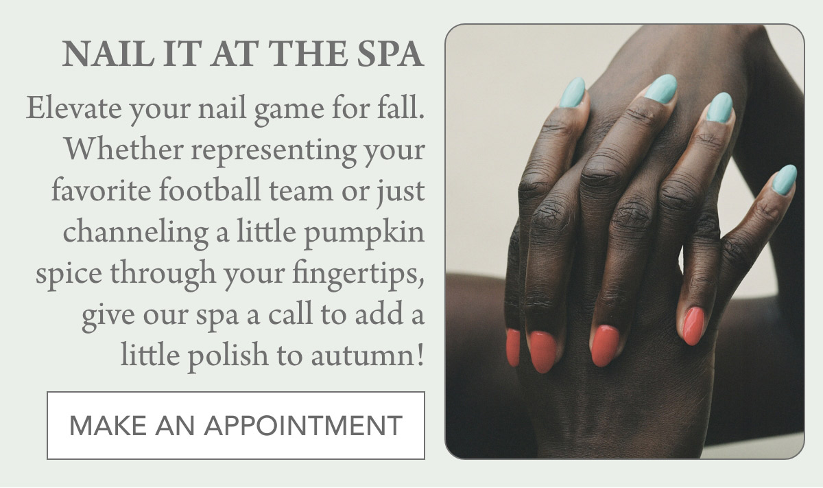 A promotional image for a spa featuring two manicured hands with pastel blue and coral nail polish. The text reads, "Nail it at the spa. Elevate your nail game for fall. Make an appointment." The message encourages booking a manicure appointment. Fearrington Village