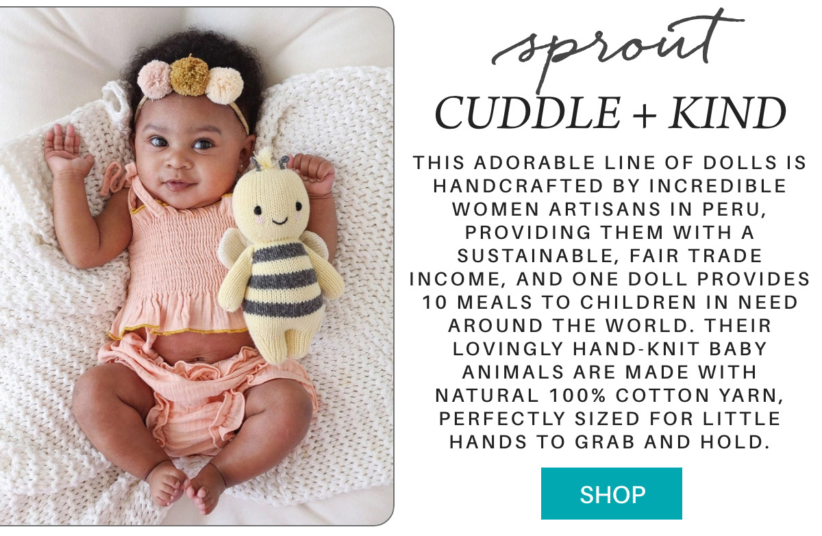 An infant wearing a peach outfit and flower headband lies on a white textured blanket, holding a knitted doll. Text beside the baby describes Cuddle + Kind dolls, handcrafted by Peruvian women artisans, providing meals to children in need. "Shop" button included. Fearrington Village