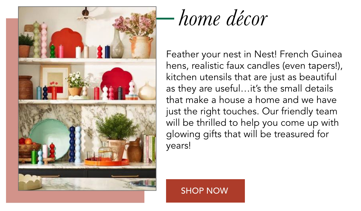 A stylish home decor display featuring colorful candles, kitchen utensils, and French Guinea hens is shown against a backdrop of textured walls and open shelves. Text highlights the selection of beautiful and useful items. A "Shop Now" button is included. Fearrington Village