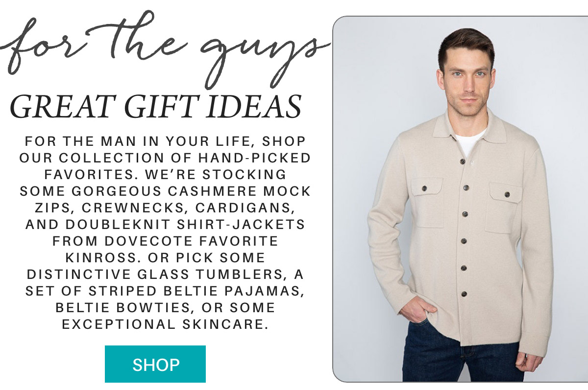 A man wearing a beige jacket stands against a plain background. Text promotes gift ideas for men, mentioning items like cashmere apparel, glass tumblers, pajamas, bowties, and skincare. A "Shop" button is at the bottom. Fearrington Village