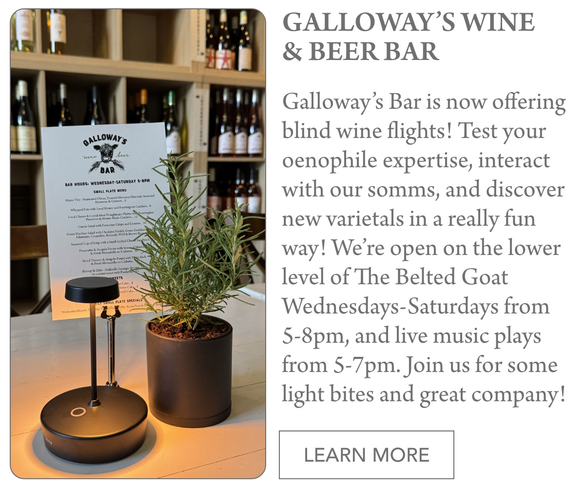 A small table displays a black lamp and a potted plant next to a wine bar flyer. The flyer details wine flights and live music offerings at Galloway's Bar from Wednesday to Saturday. A "Learn More" button is at the bottom. Fearrington Village