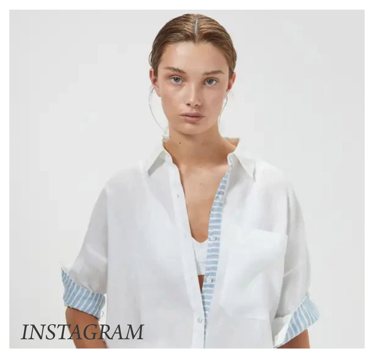 A person with light brown hair pulled back is wearing a white shirt with rolled sleeves and light blue striped details. They stand against a plain, light-colored background. The word "Instagram" is in the bottom left corner. Fearrington Village