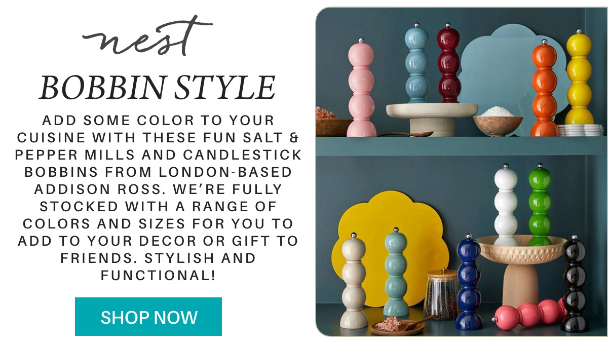 Colorful salt and pepper mills, candle stick bobbins in various sizes displayed on shelves. Text highlights these items from Addison Ross, based in London, as stylish and functional decor gifts. "Shop Now" button included. Fearrington Village