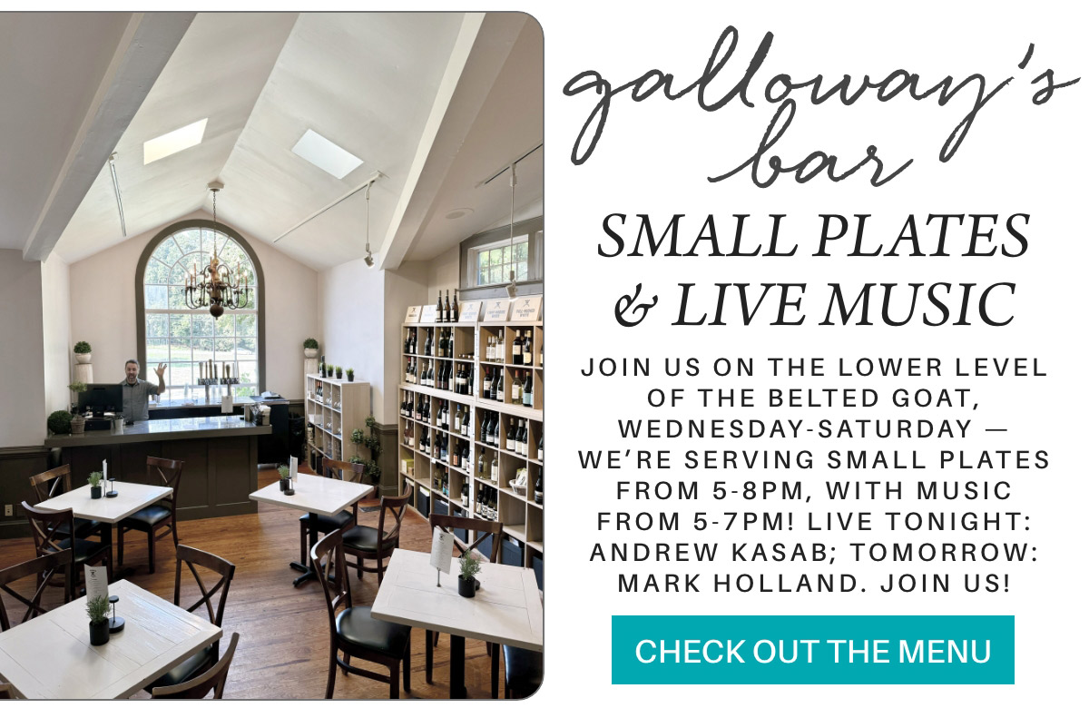 Elegant interior of Galloway's Bar with large arched window, shelves stocked with wine, and a bar area. Sign advertises "Small Plates & Live Music" from Wednesday to Saturday, with musicians Andrew Kasab tonight and Mark Holland tomorrow. Fearrington Village