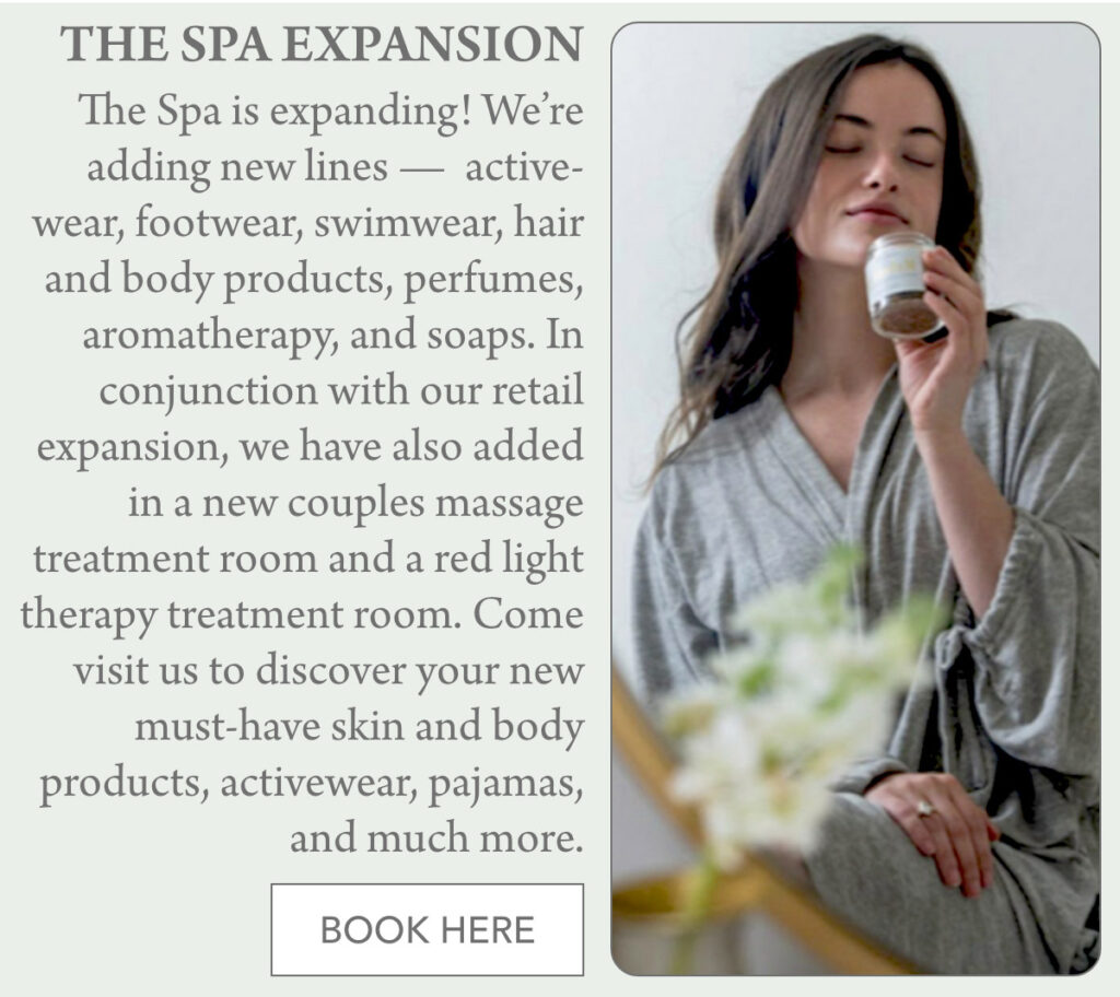 A woman in a gray robe sits peacefully with closed eyes, holding a small jar near her face. Beside her, text announces the spa’s expansion with new products and services. A button at the bottom reads "Book Here. "The Spa is expanding! We’re adding new lines — active-wear, footwear, swimwear, hair and body products, perfumes, aromatherapy, and soaps. In conjunction with our retail expansion, we have also added in a new couples massage treatment room and a red light therapy treatment room. Come visit us to discover your new must-have skin and body products, activewear, pajamas, and much more." Fearrington Village