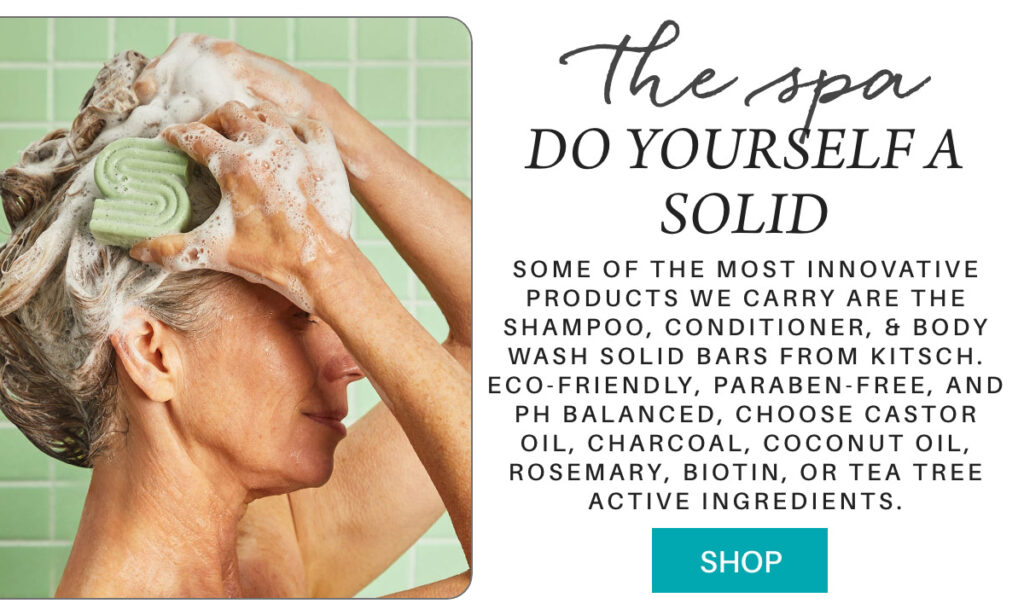 A woman washing her hair with a green solid shampoo bar in a shower, next to text promoting eco-friendly, paraben-free hair and body wash bars. A blue "Shop" button appears at the bottom. "some of the most innovative products we carry are the shampoo, conditioner, & body wash solid bars from Kitsch. eco-friendly, paraben-free, and ph balanced, choose castor oil, charcoal, coconut oil, rosemary, biotin, or tea tree active ingredients. " Fearrington Village
