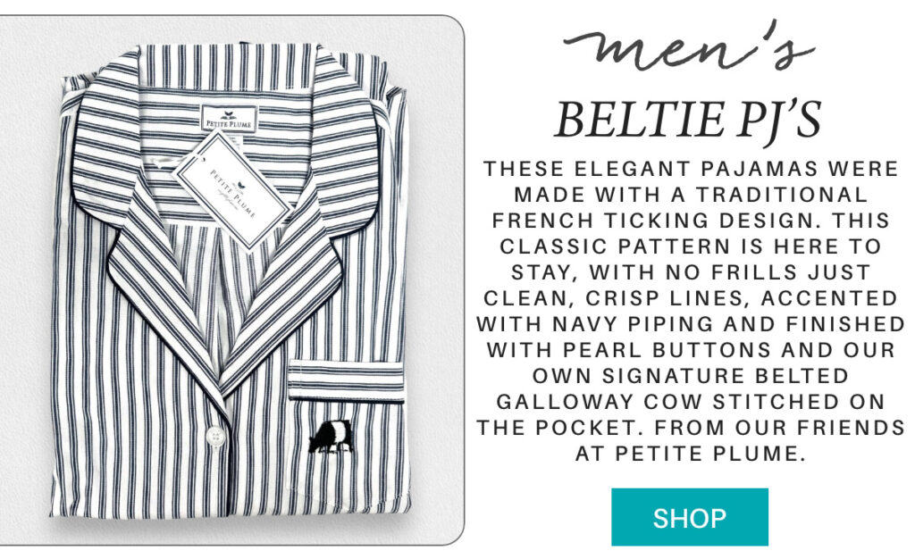 A folded set of striped pajamas with navy piping, pearl buttons, and a cow logo on the pocket. The pajamas are labeled “BELTIE PJ’S” and described as elegant, French-style sleepwear from Petite Plume. "These elegant pajamas were made with a traditional French ticking design. This classic pattern is here to stay, with no frills just clean, crisp lines, accented with navy piping and finished with pearl buttons and our own signature Belted Galloway Cow stitched on the pocket. from our friends at petite plume." Fearrington Village