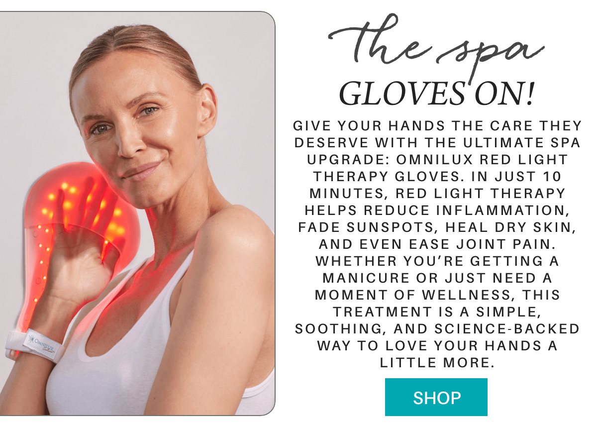 A smiling woman holds a glowing red therapy glove to her hand. Next to her, text describes the benefits of Omnilux Red Light Therapy Gloves for hand care, promoting wellness and soothing pain, with a "Shop" button below. "Give your hands the care they deserve with the ultimate spa upgrade: Omnilux Red Light Therapy Gloves. In just 10 minutes, red light therapy helps reduce inflammation, fade sunspots, heal dry skin, and even ease joint pain. Whether you’re getting a manicure or just need a moment of wellness, this treatment is a simple, soothing, and science-backed way to love your hands a little more." Fearrington Village