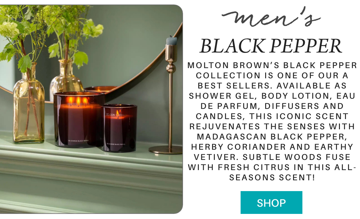 Two black candles sit on a green shelf beside a gold decorative object and a plant. Text describes Molton Brown's men's Black Pepper scent collection and its products, with a “Shop” button below. "molton brown’s black pepper collection is one of our a best sellers. available as shower gel, body lotion, eau de parfum, diffusers and candles, this iconic scent rejuvenates the senses with Madagascan black pepper, herby coriander and earthy vetiver. Subtle woods fuse with fresh citrus in this all-seasons scent!" Fearrington Village