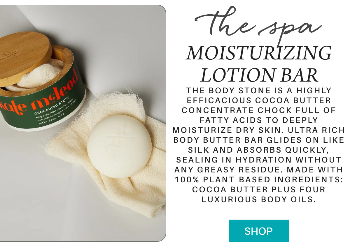 A round white lotion bar sits on a soft white cloth next to an open wooden container labeled “Kate McLeod,” with a description of the moisturizing lotion bar’s benefits and a teal "SHOP" button below. "The Body Stone is a highly efficacious cocoa butter concentrate chock full of fatty acids to deeply moisturize dry skin. Ultra rich body butter bar glides on like silk and absorbs quickly, sealing in hydration without any greasy residue. Made with 100% plant-based ingredients: cocoa butter plus four luxurious body oils." Fearrington Village
