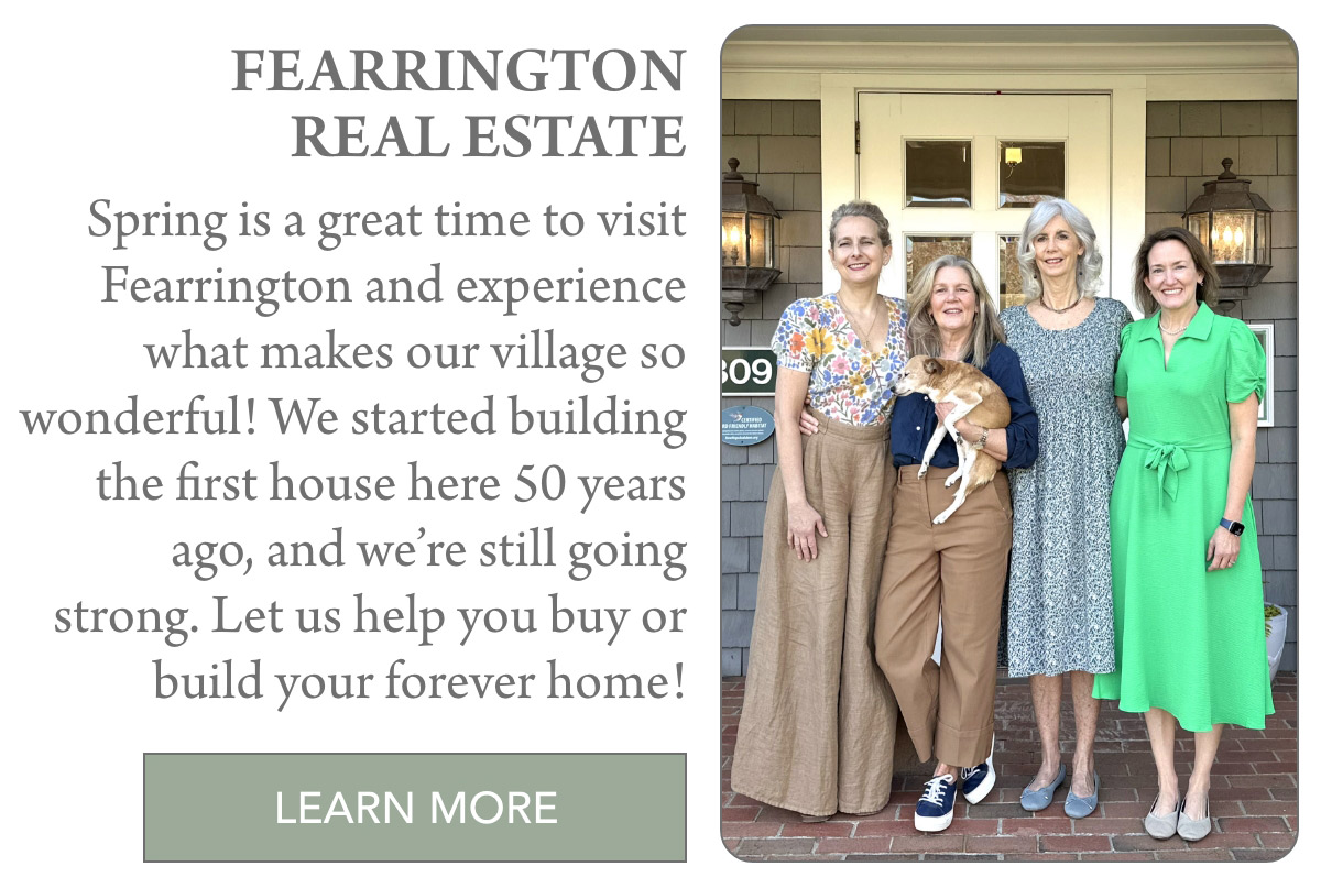 Four women stand smiling on a porch in front of a home; one woman holds a small dog. The image promotes Fearrington Real Estate, inviting people to buy or build homes in their village. A "Learn More" button is at the bottom. Fearrington Village